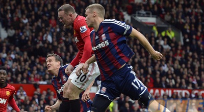 וויין רוני נוגח. כבש צמד לשער הנכון (רויטרס) וויין רוני נוגח. כבש צמד לשער הנכון (רויטרס)