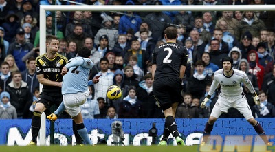 קרלוס טבס בועט פנימה את השער השני (רויטרס) קרלוס טבס בועט פנימה את השער השני (רויטרס)