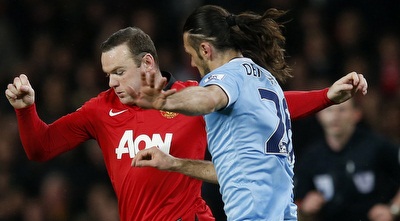 מרטין דמיצ´ליס מול וויין רוני (רויטרס) מרטין דמיצ´ליס מול וויין רוני (רויטרס)