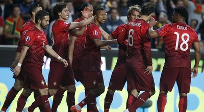 שחקני פורטוגל חוגגים (רויטרס) שחקני פורטוגל חוגגים (רויטרס)