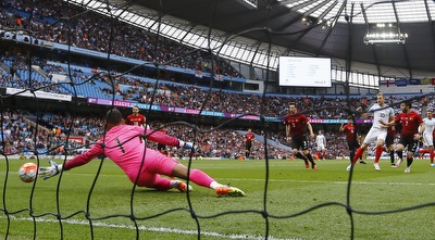 בבקאן עוצר את קיין (רויטרס) בבקאן עוצר את קיין (רויטרס)