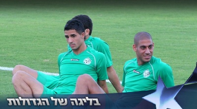 קטן עם כיאל. הקפטן הוא היחיד בחיפה ששיחק בהרכב בליגת האלופות (קובי אליהו)
