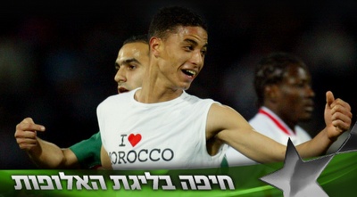 צ&acute;מאק חוגג באליפות אפריקה. שם הוא נהפך לכוכב (רויטרס)