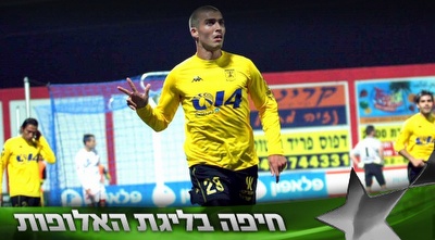 לרואה חוגג במדי בית&qout;ר. &qout;בישראל אוהדים מאוד את הכדורגל&qout; (רויטרס)