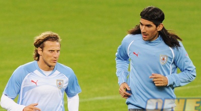 דייגו פורלאן ואבראו. באורוגוואי מחמיאים, אבל רוצים לנצח (GettyImages) דייגו פורלאן ואבראו. באורוגוואי מחמיאים, אבל רוצים לנצח (GettyImages)