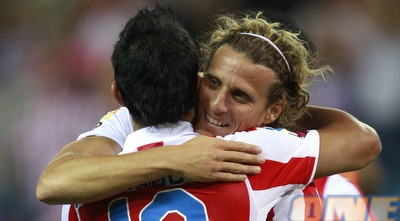 פורלאן מודה לאגוארו לאחר השער השני (רויטרס) פורלאן מודה לאגוארו לאחר השער השני (רויטרס)