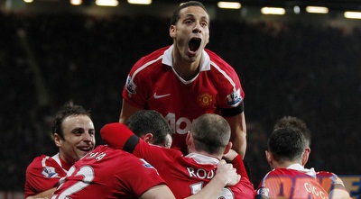 שחקני מנצ´סטר יונייטד חוגגים (רויטרס) שחקני מנצ´סטר יונייטד חוגגים (רויטרס)